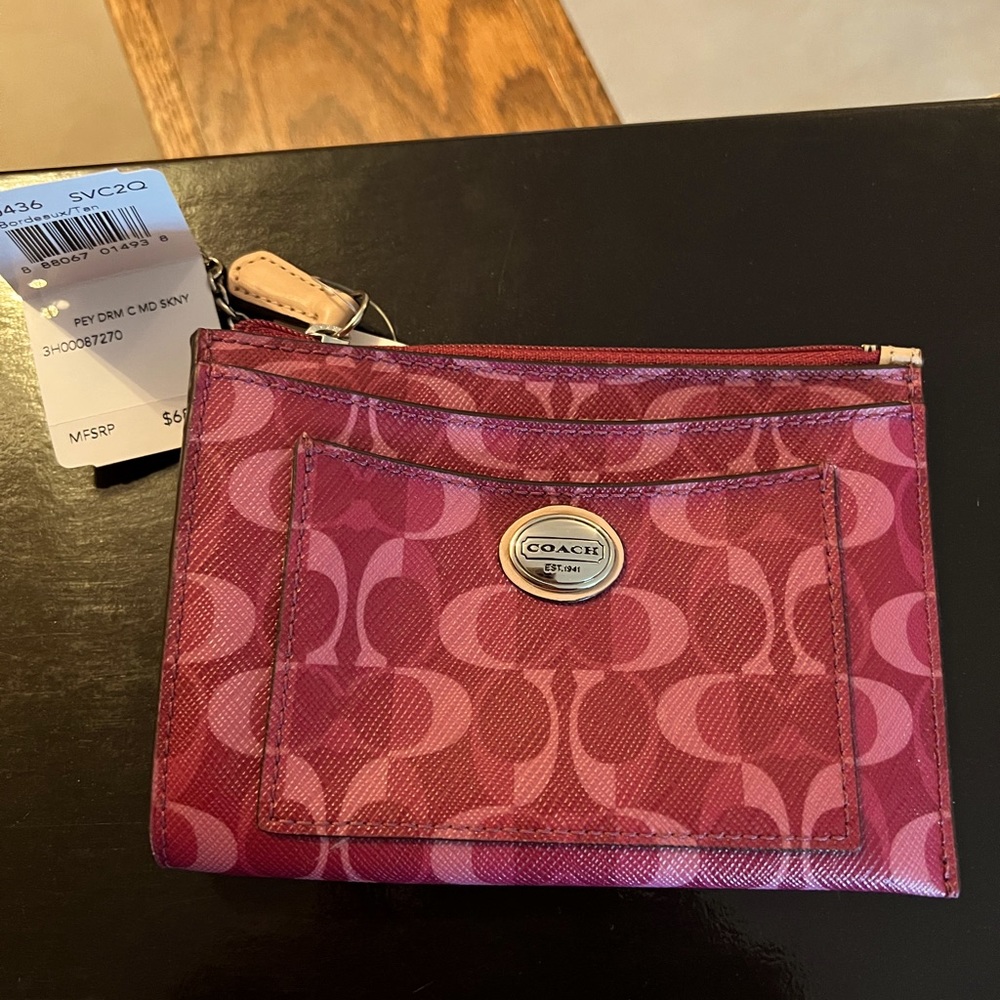 NWT card holder with secure zipper for valuables. Easy clean fabric